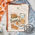 Thankful — thankful lettering with an illustrated Thanksgiving meal