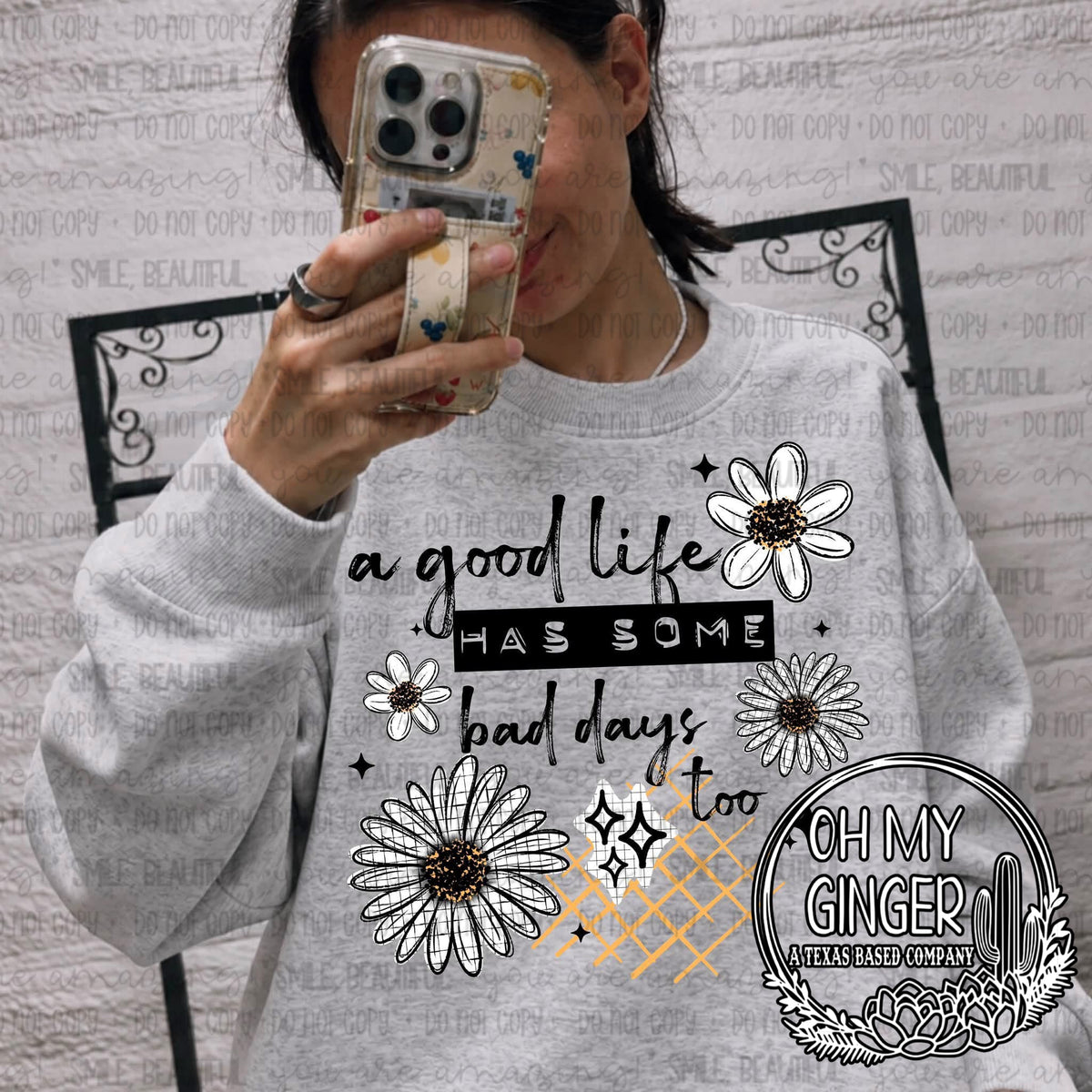 A Good Life Has Some Bad Days Too — encouraging good-life lettering surrounded by daisies