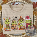 Green Guy Give Thanks — green holiday characters with Thanksgiving pumpkins and give-thanks lettering