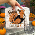 Gobble x3 — gobble lettering surrounding a turkey with patterned feathers