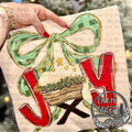 Joy - Baby Jesus — JOY lettering with baby Jesus, evergreen branches and a green bow