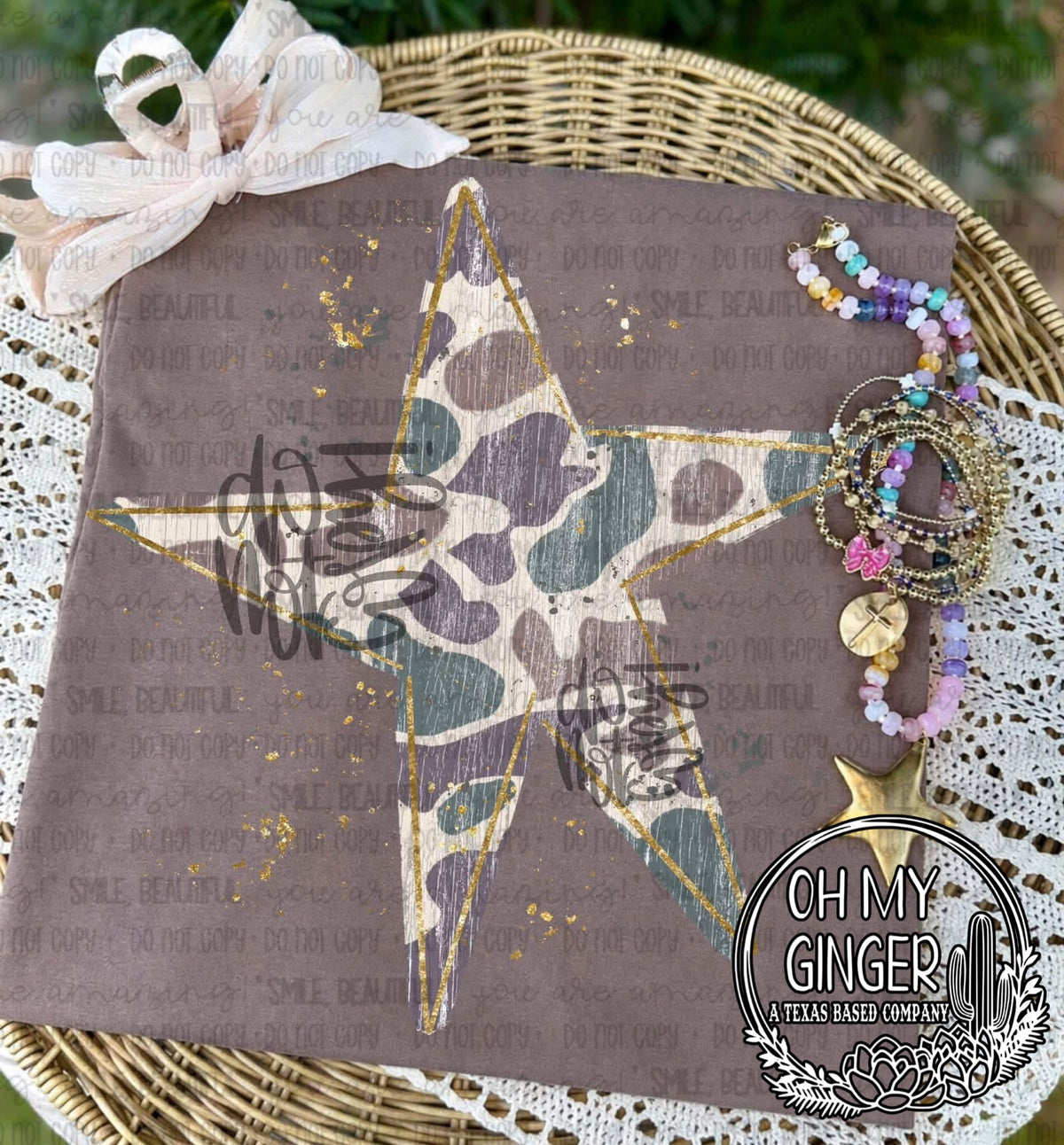 Camo Star — a camouflage-patterned star with hanging ribbon details