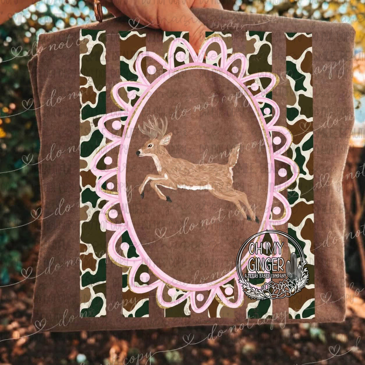Deer - Camo Stripes — a deer silhouette in a pink decorative frame over camouflage stripes