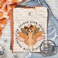 Give Thanks Turkey — a bow-wearing turkey surrounded by give-thanks lettering