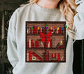 Christmas Bookshelf — a Christmas bookshelf filled with books, stockings and a red bow